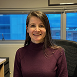 Silva Pecini Morris sitting in her office in Van Metre Hall